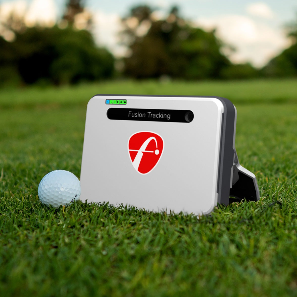 FlightScope Mevo+ Limited Edition launch monitor close-up with premium carbon-fiber finish