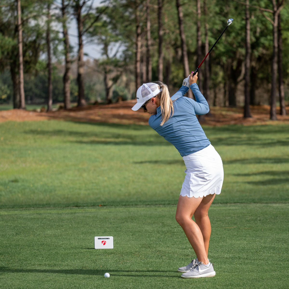 FlightScope Mevo+ Limited Edition launch monitor set up outdoors for accurate golf shot tracking